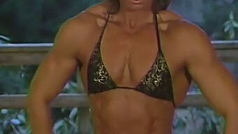 Joanne Mccartney'S Gold And Black Bikini Performance