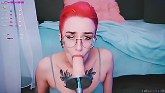 Glasses-Wearing Teen Girl Enjoys Mouth Sex With A Dildo