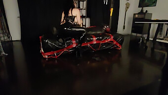 Latex Fetish: Cock Sitting And Slapping In Bag